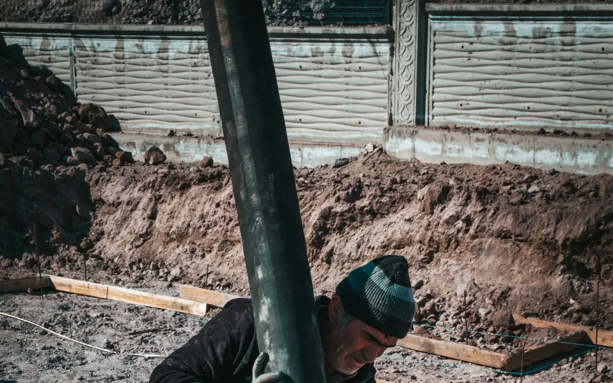 Pouring concrete into formwork