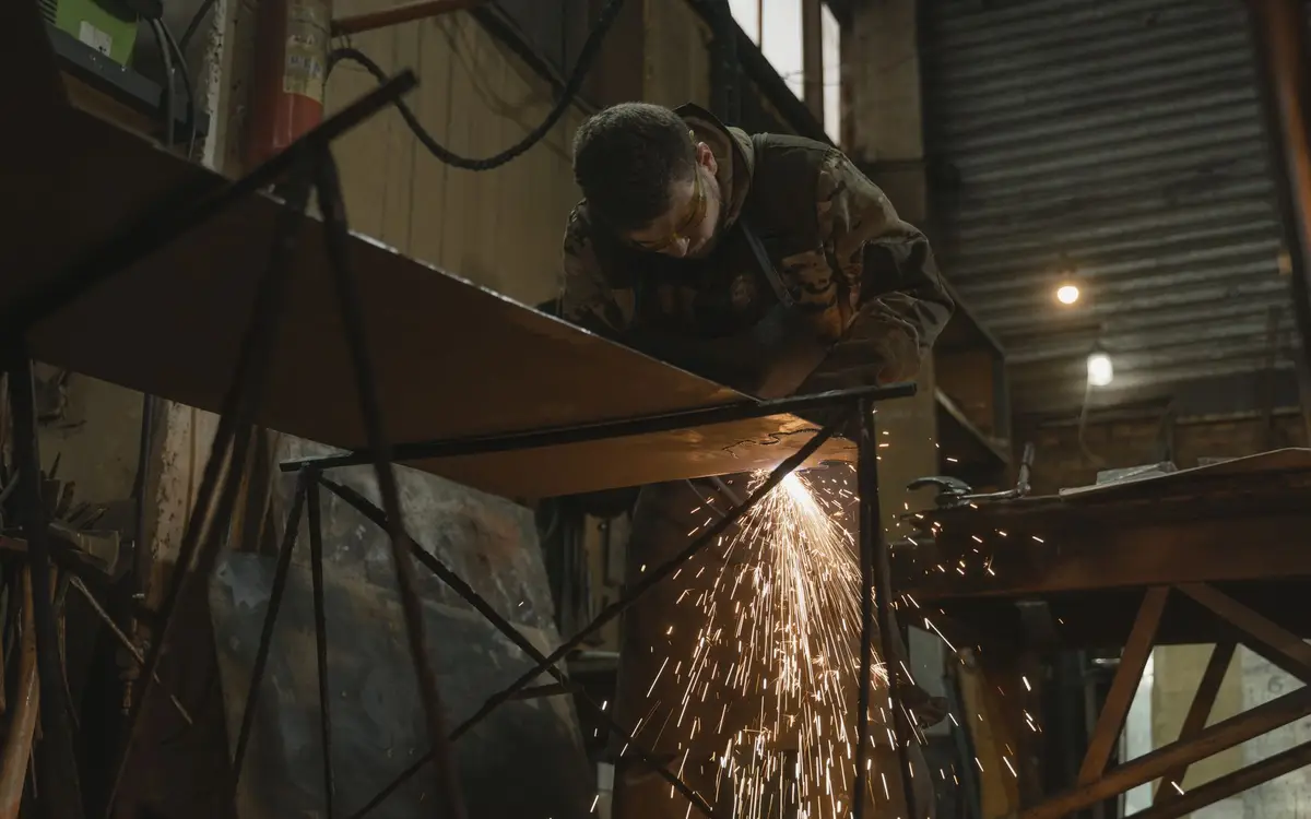 Welding a metal assembly in a workshop
